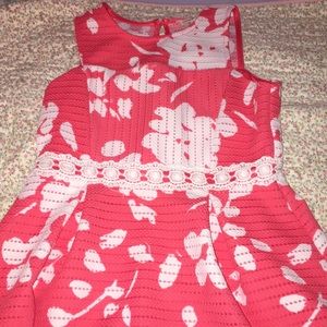 A coral colored dress